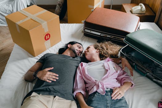 happy couple in front of their new home