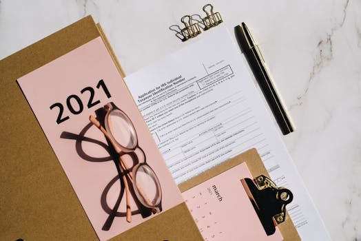 cluttered desk with financial documents