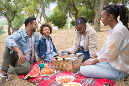 a group of friends enjoying a picnic in the park