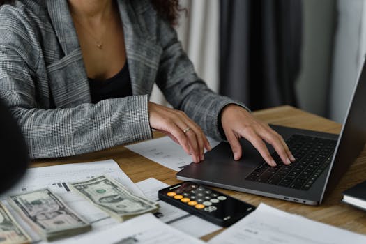 a person sorting through bills